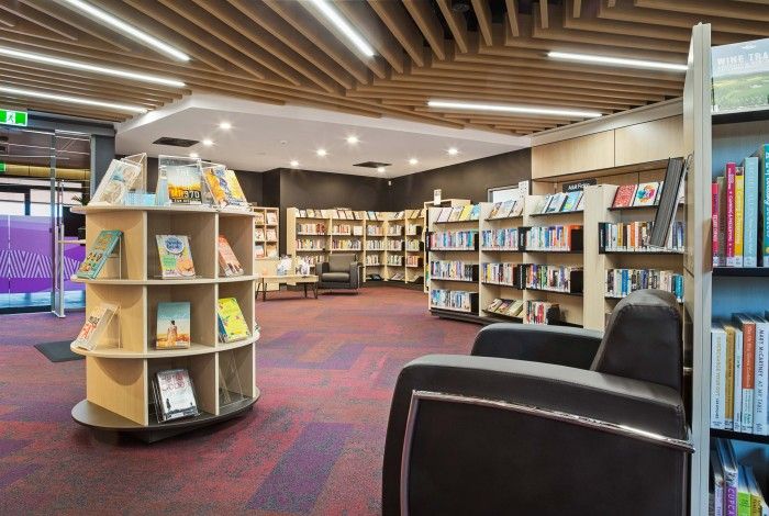 inside wickham library with shelves of books