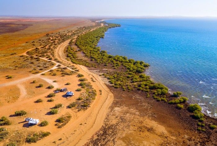 Drone shot of camp ground on coast