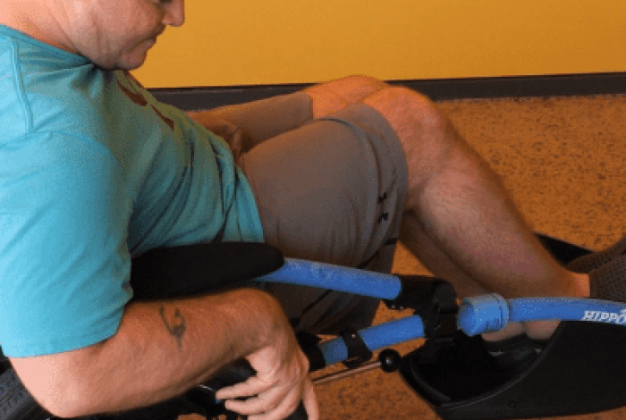 Man sitting in all-terrain wheelchair 