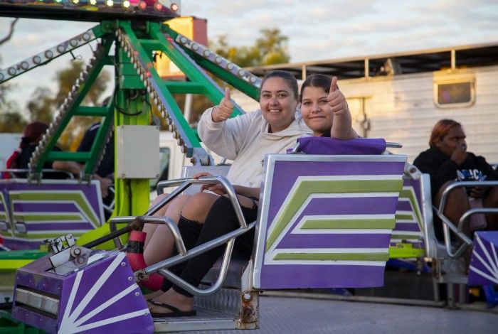 Two people enjoying a ride at FeNAClNG