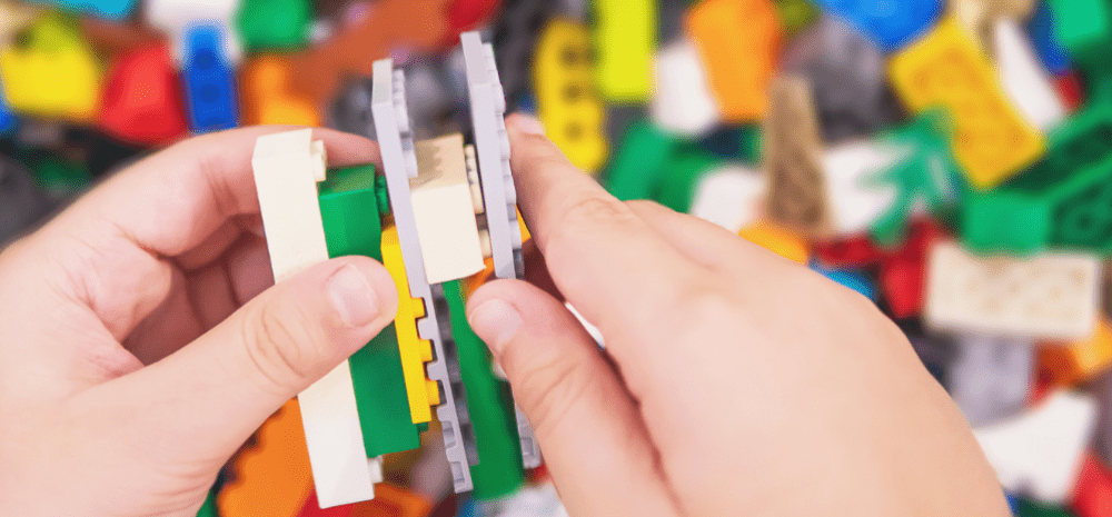 child playing with lego